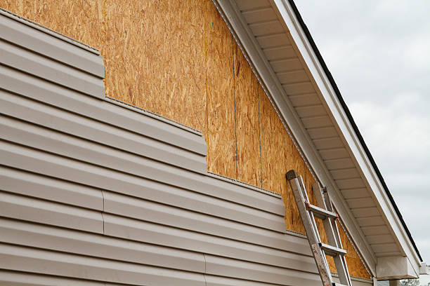 Professional Emergency Siding Repair technician working in Morristown, OH